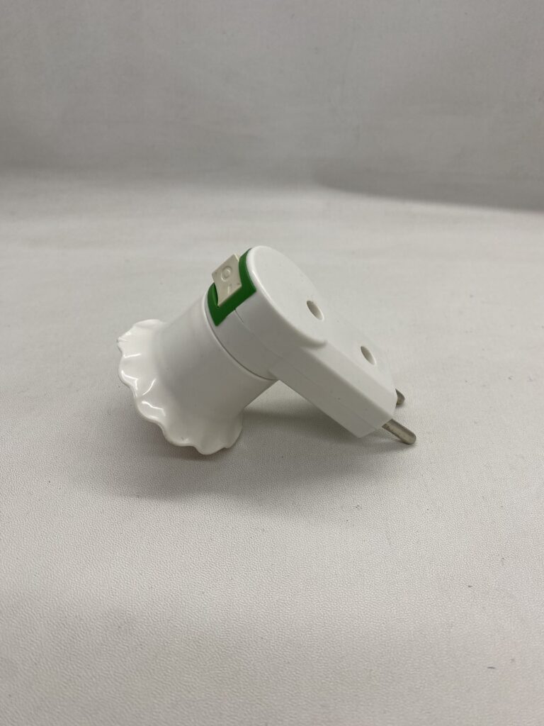 Power strip with multiple outlets for electronic devices, white and green design.