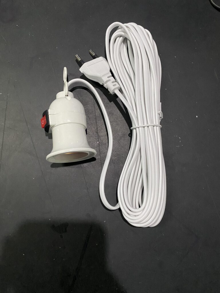 Extension cord with multiple outlets for fitting room devices.