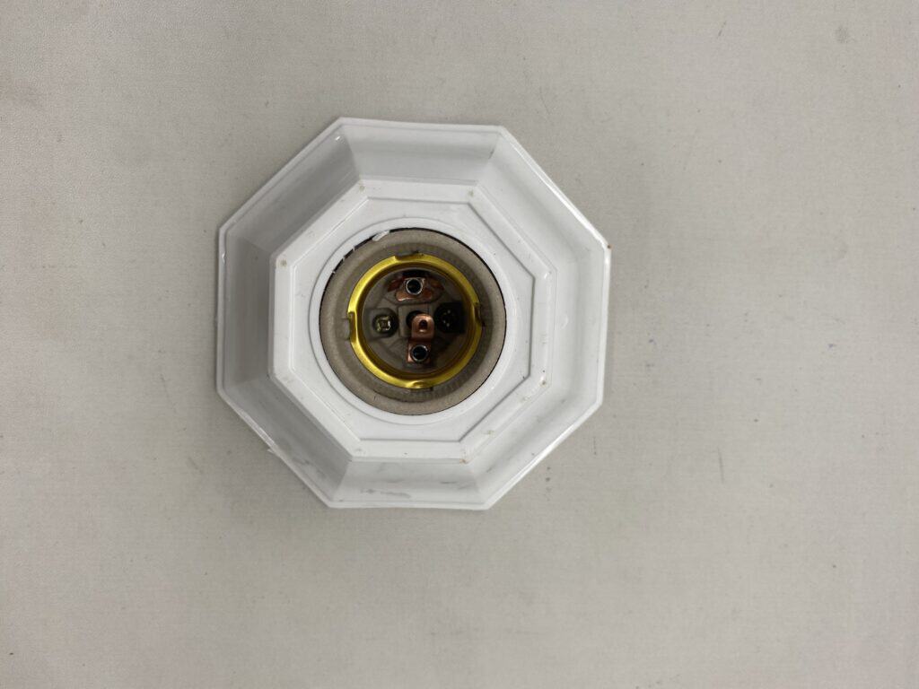 EV charging port with protective cover for electric cars.