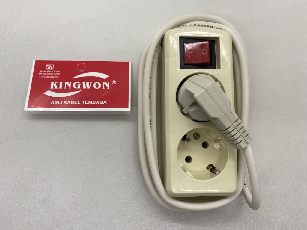 Power strip with multiple electrical outlets and a red power switch for versatile device connections.
