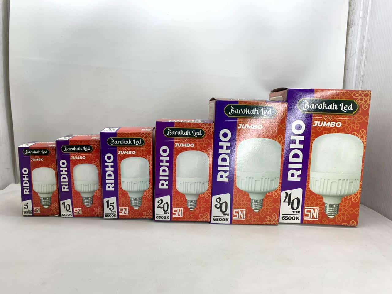 Set of Barokah Ridho LED bulbs in various sizes for home lighting.