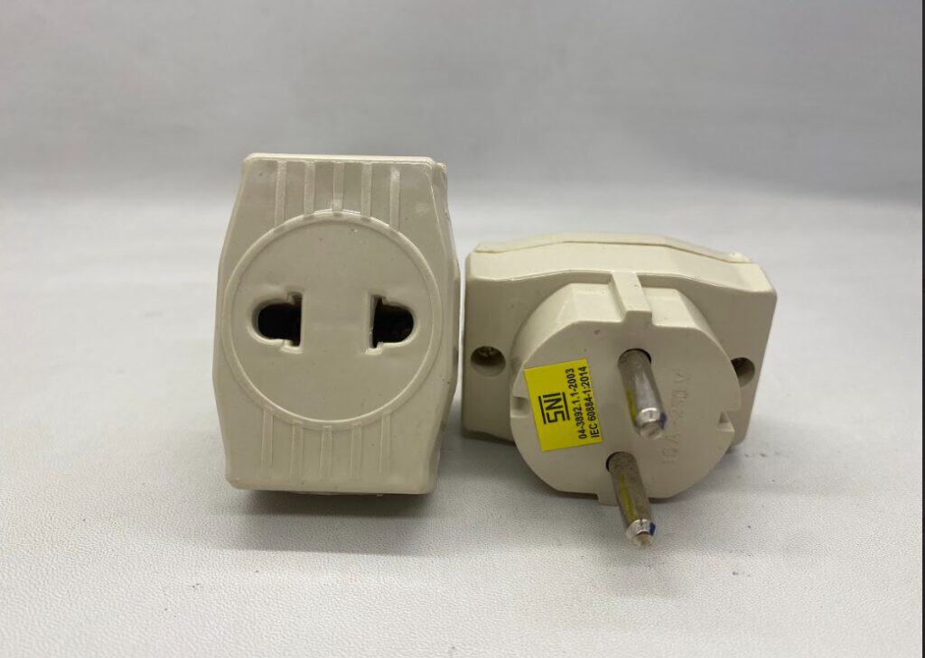 Power adapter plug with European socket and plug for electrical appliances.